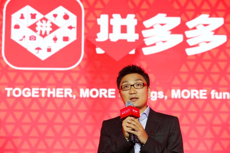 FILE PHOTO: Colin Huang, founder and CEO of the online group discounter Pinduoduo, speaks during the company's stock trading debut at the Nasdaq Stock Market in New York, during an event in Shanghai