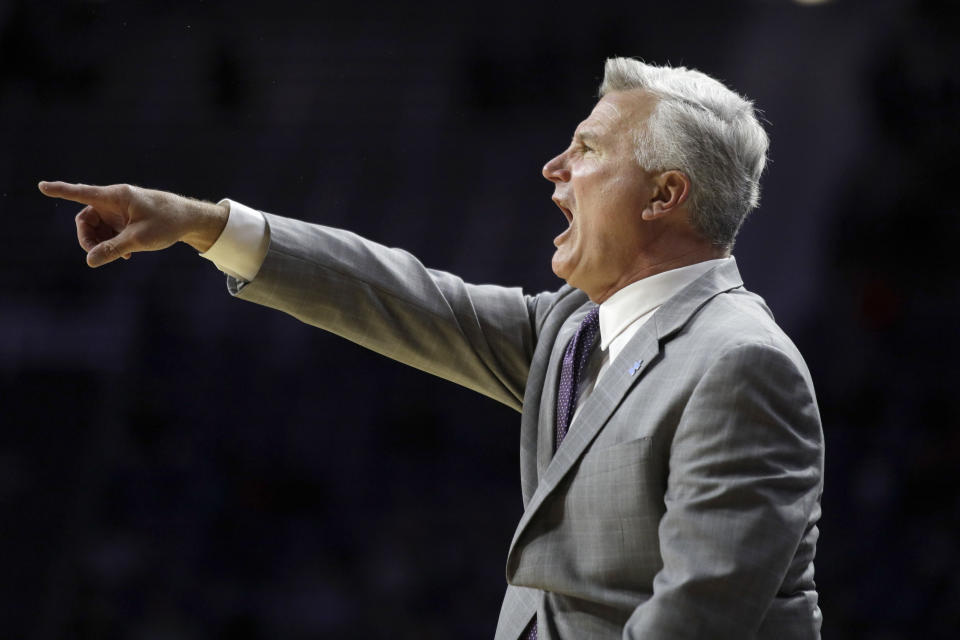 Kansas State head coach Bruce Weber directs his team during the first half of an NCAA college basketball game against Baylor in Manhattan, Kan., Monday, Feb. 3, 2020. (AP Photo/Orlin Wagner)