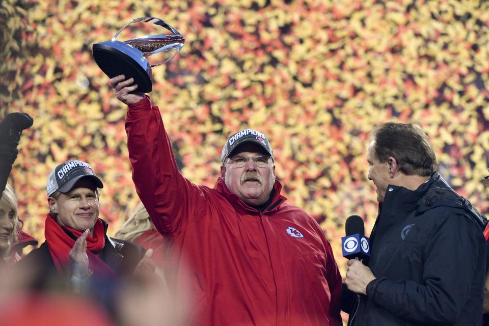 Kansas City Chiefs head coach Andy Reid holds the Lamar Hunt Trophy after the NFL AFC Championship football game against the Tennessee Titans Sunday, Jan. 19, 2020, in Kansas City, MO. The Chiefs won 35-24 to advance to Super Bowl 54. (AP Photo/Ed Zurga)