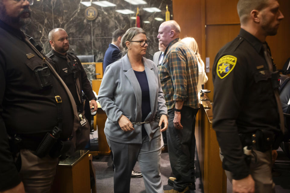 Defendant Jennifer Crumbley exits the courtroom during her jury trial at the Oakland County Courthouse, Wednesday, Jan. 31, 2024, in Pontiac, Mich. Crumbley, 45, is charged with involuntary manslaughter. Prosecutors say she and her husband were grossly negligent and could have prevented the four deaths if they had tended to their son’s mental health. They’re also accused of making a gun accessible at home. (Katy Kildee/Detroit News via AP, Pool)