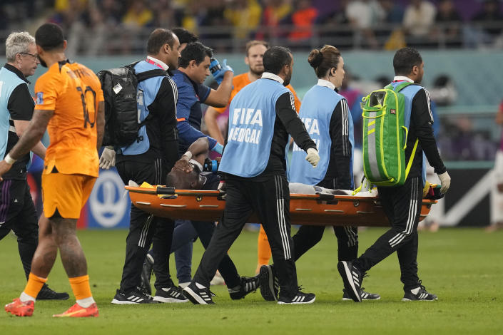 Ecuador's Enner Valencia is taking out the pitch in a stretcher during the World Cup group A soccer match between Netherlands and Ecuador, at the Khalifa International Stadium in Doha, Qatar, Friday, Nov. 25, 2022. (AP Photo/Themba Hadebe)