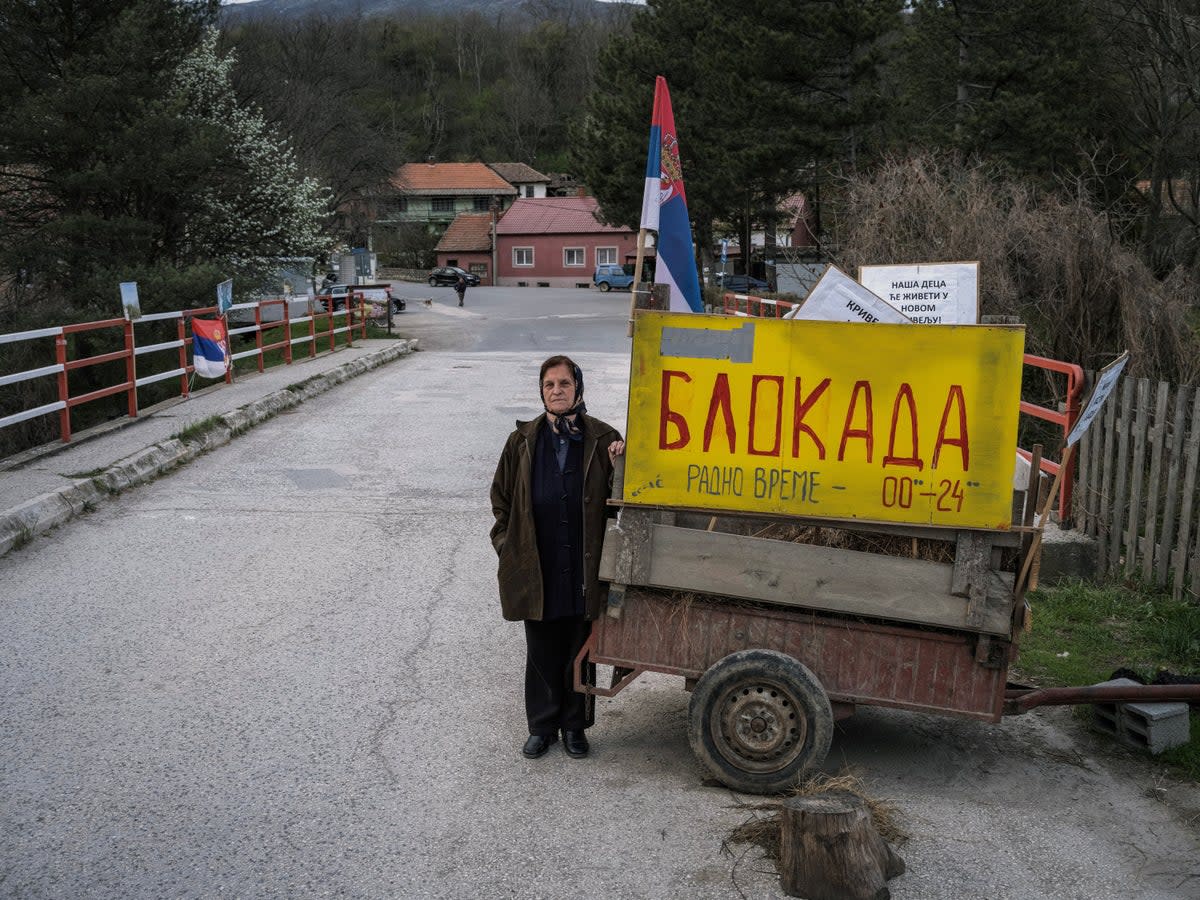 Stana Jorgovanovic, 79, at a barricade in Krivelj, eastern Serbia. ‘I feel so sorry about our beautiful village, I am not sure I will survive the move,’ she says  (Reuters)