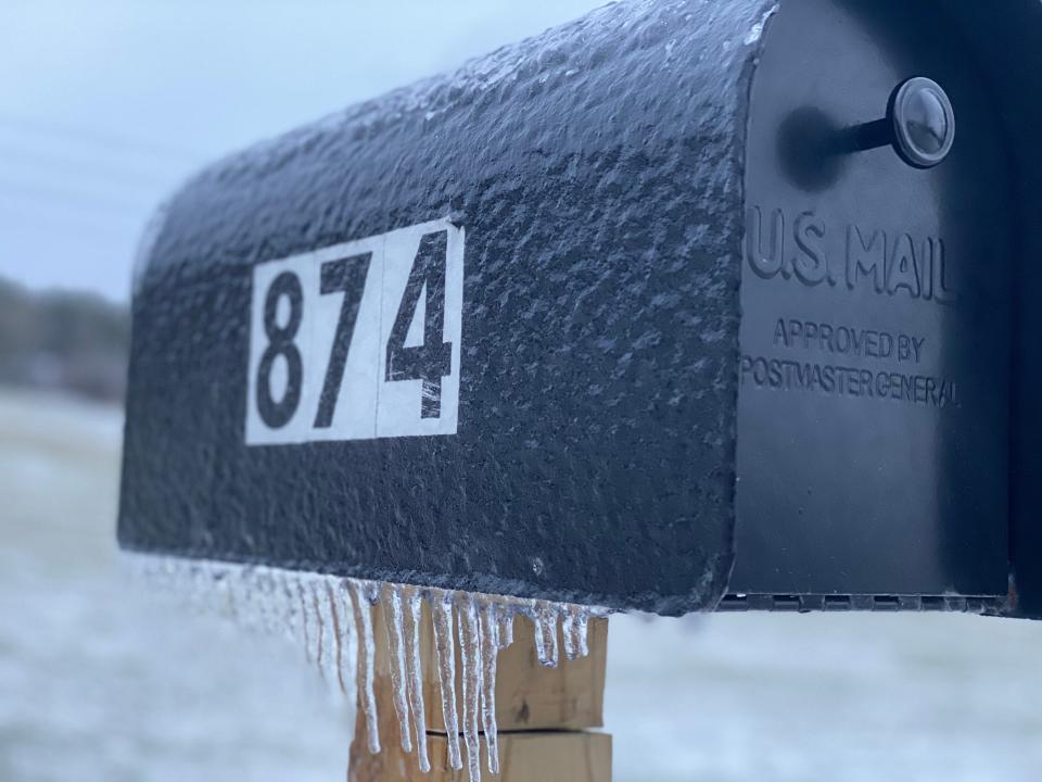 Ripples of ice and frozen icicle stalactites on a mailbox. Taken Dec. 30, 2019.