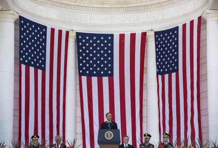 President Barack Obama speaks during Memorial Day ceremonies at Arlington National Cemetery in Virginia May 26, 2014. REUTERS/Joshua Roberts