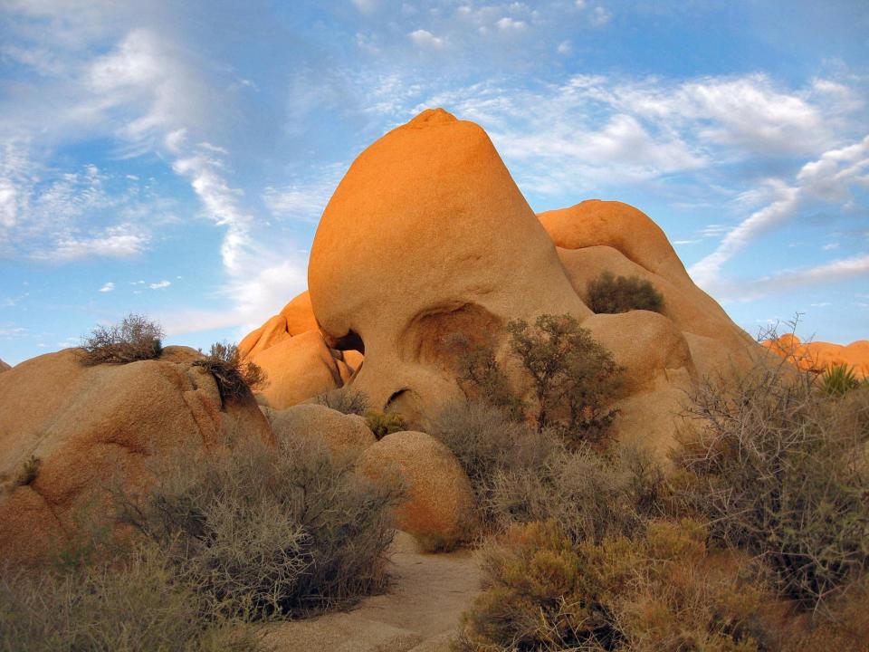 Skull Rock is a popular spot for visitors to stop along Joshua Tree National Park's east-west road.