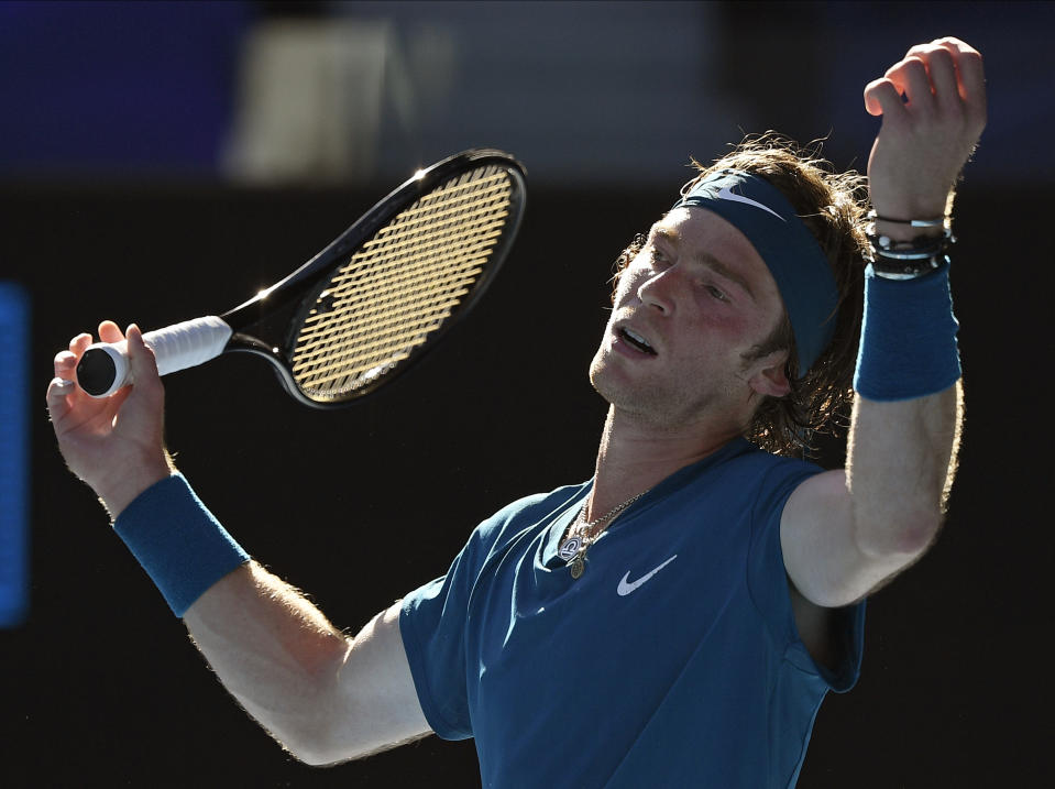 Russia's Andrey Rublev reacts after losing a point to compatriot Daniil Medvedev during their quarterfinal match at the Australian Open tennis championship in Melbourne, Australia, Wednesday, Feb. 17, 2021.(AP Photo/Andy Brownbill)