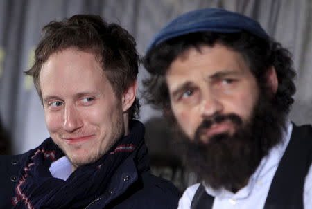 Director of the film "Son of Saul" Laszlo Nemes (L) smiles during a news conference in Budapest, Hungary, May 28, 2015. REUTERS/Bernadett Szabo