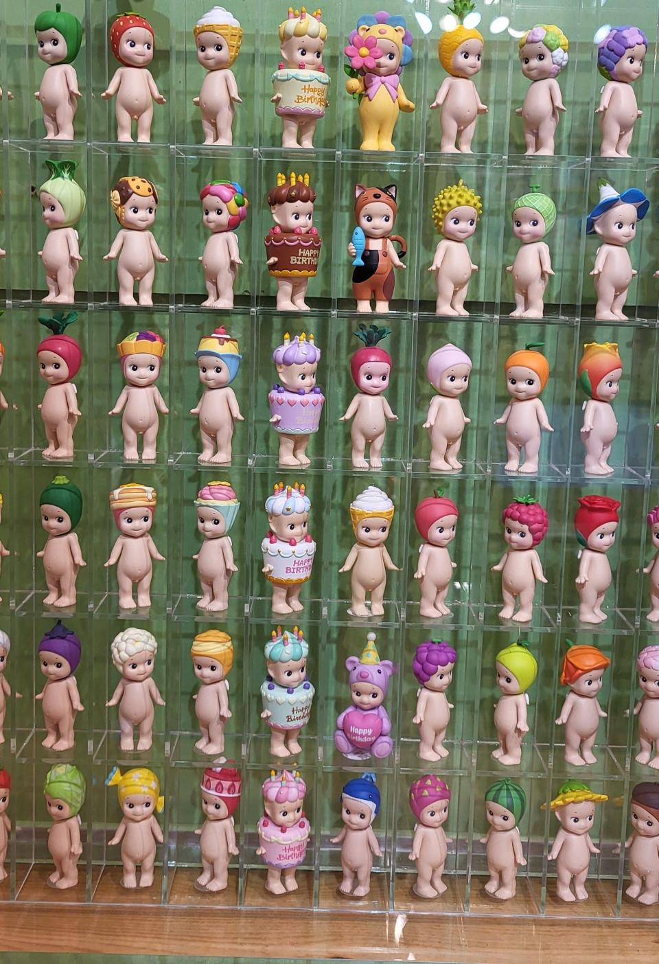 A wall of Sonny Angel figurines at Happy Up Inc. in Clayton, Missouri.