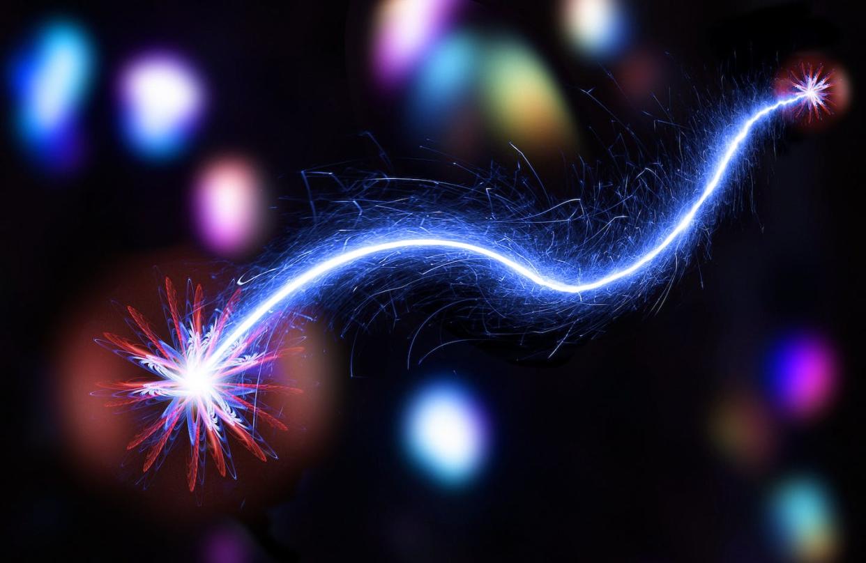 When two particles are entangled, the state of one is tied to the state of the other. <a href="https://www.gettyimages.com/detail/illustration/quantum-entanglement-conceptual-artwork-royalty-free-illustration/1333715460" rel="nofollow noopener" target="_blank" data-ylk="slk:Victor de Schwanberg/Science Photo Library via Getty Images;elm:context_link;itc:0;sec:content-canvas" class="link ">Victor de Schwanberg/Science Photo Library via Getty Images</a>