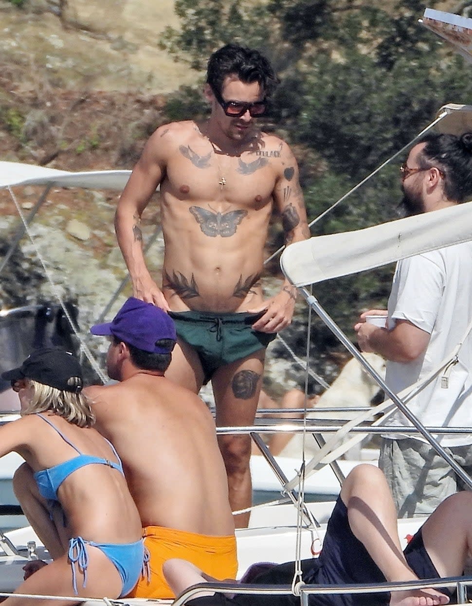 Harry Styles Puts Olivia Tattoo On Display in Italy 