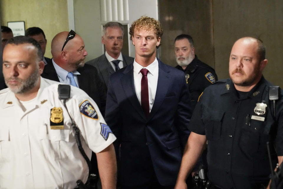 Daniel Penny departs Manhattan Criminal Court following his arraignment, Wednesday, June 28, 2023, in New York. Penny, 24, pleaded not guilty to second-degree manslaughter and criminally negligent homicide in the May 1 death of Jordan Neely, a former Michael Jackson impersonator who was shouting and begging for money when Penny pinned him to the floor of the moving subway car with the help of two other passengers and held him in a chokehold for more than three minutes. (AP Photo/John Minchillo)