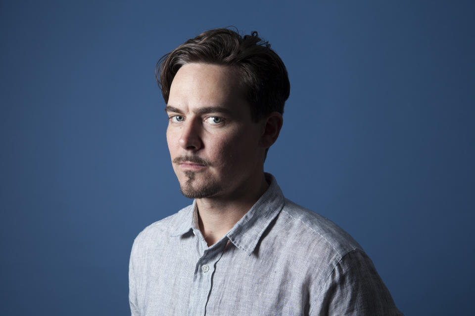 In this Wednesday, Aug. 8, 2018 photo, Adrian Buitenhuis, director of the documentary film "I Am Paul Walker," poses for a portrait in Los Angeles. The new one-hour documentary about the actor's childhood, family and career is directed by Buitenhuis. It premiered last weekend on the Paramount Network. (Photo by Rebecca Cabage/Invision/AP)