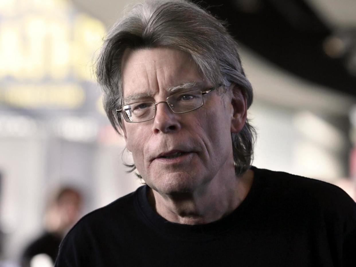 Stephen King poses for photographers on 13 November 2013 in Paris, France: KENZO TRIBOUILLARD/AFP via Getty Images