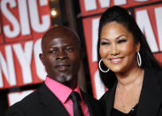 After months of breakup reports, Kimora Lee Simmons and Djimon Hounsou, who have a 3-year-old son named Kenzo, announced on Nov. 21 they have officially separated after more than five years together as a couple. REUTERS/Eric Thayer (UNITED STATES ENTERTAINMENT)