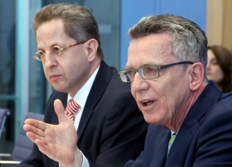 Hans-Georg Maassen, President of the Federal Office for the Protection of the Constitution, and Thomas de Maiziere give a press conference in Berlin on June 30, 2015