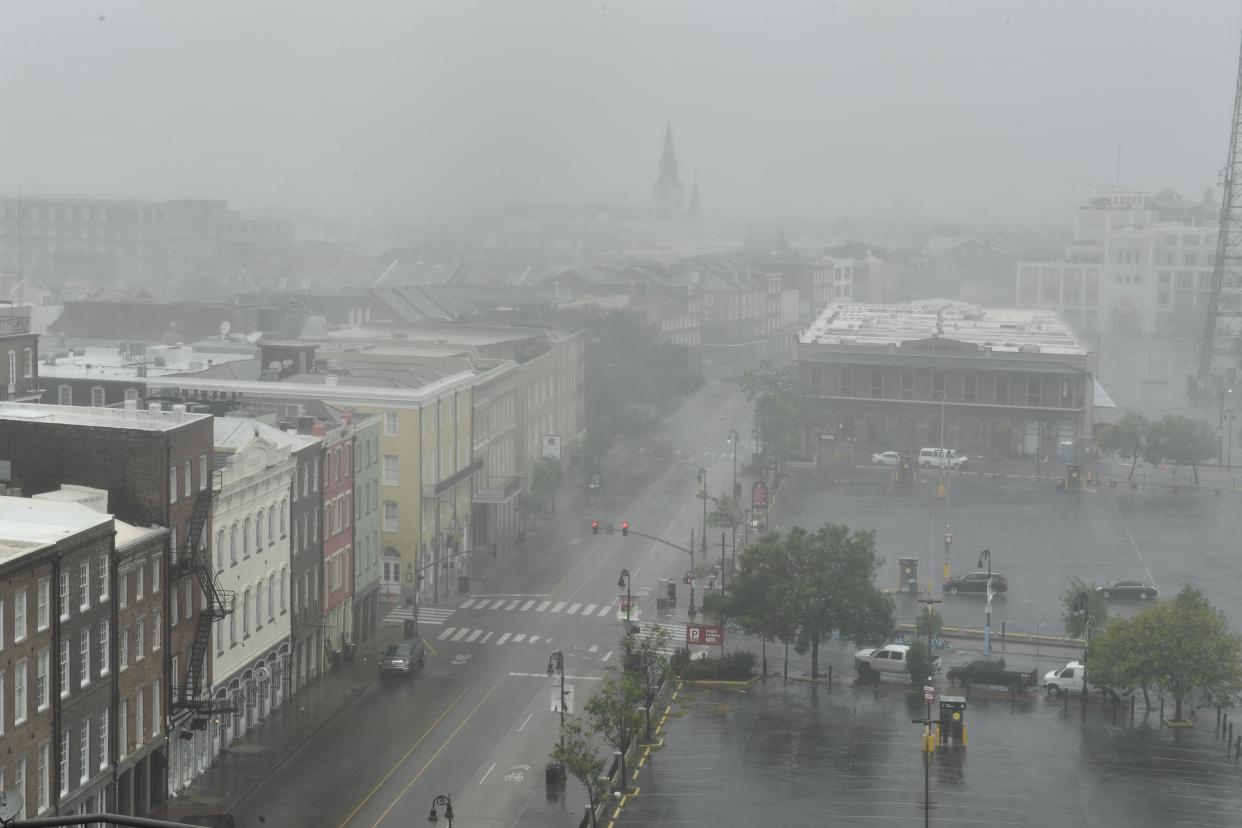 Rain batters N. Peters St. in New Orleans, La., with St. Louis Cathedral visible in the distance (back L), on Aug. 29, 2021, after Hurricane Ida made landfall. Ida made landfall as "an extremely dangerous" Category 4 storm in Louisiana on Sunday, according to the National Hurricane Center, 16 years to the day after Hurricane Katrina devastated the region. "Extremely dangerous Category 4 Hurricane Ida makes landfall near Port Fourchon, Louisiana," the NHC wrote in an advisory. Ida struck the port, which is located 100 miles directly south of New Orleans, packing maximum sustained winds estimated at 150 miles per hour.