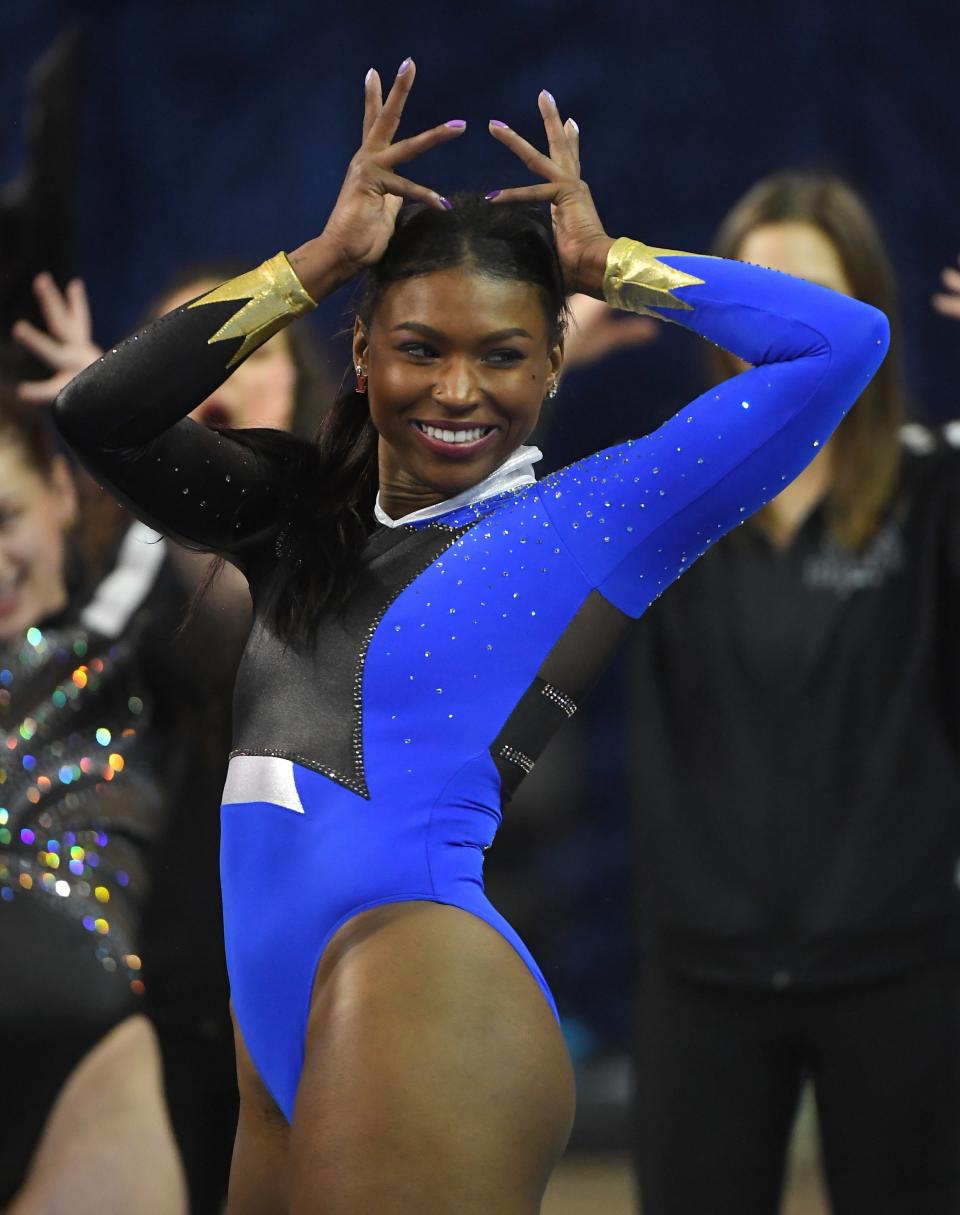 Nia Dennis performs the floor exercise during UCLA Gymnastics Meet the Bruins intra squad event.