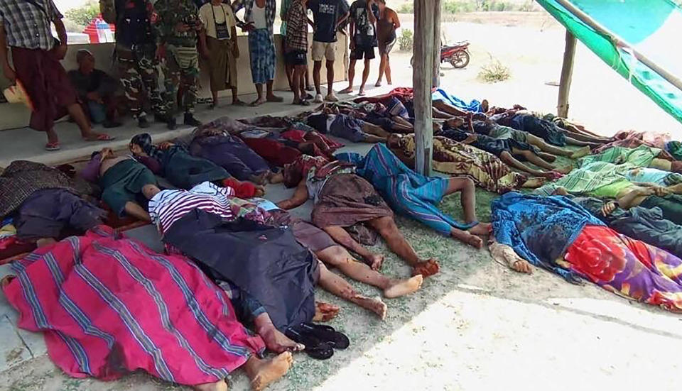 This UGC photo provided by the People’s Defense Force shows bodies of the victims allegedly killed by soldiers of Myanmar’s military government are laid out before being buried at the burial ground outside of Let Htoke Taw village in Sagaing region’s Myinmu township, Myanmar, Saturday, May 11, 2024. Reports that soldiers of Myanmar’s military government last week carried out a massacre of more than 30 civilians in a village in central Myanmar were supported Monday in interviews with a local administrator and a man who claims to have survived the killings. (People’s Defense Force via AP)