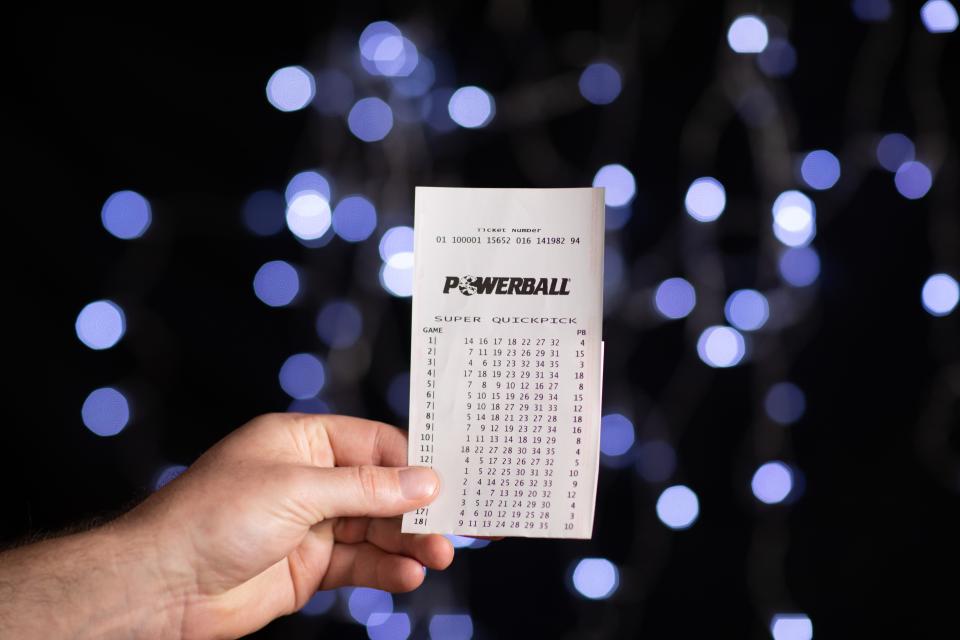 Photo shows Powerball ticket as officials search for the $80 million winner. 