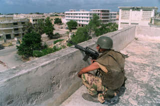 A Italian United Nations soldier observes the 