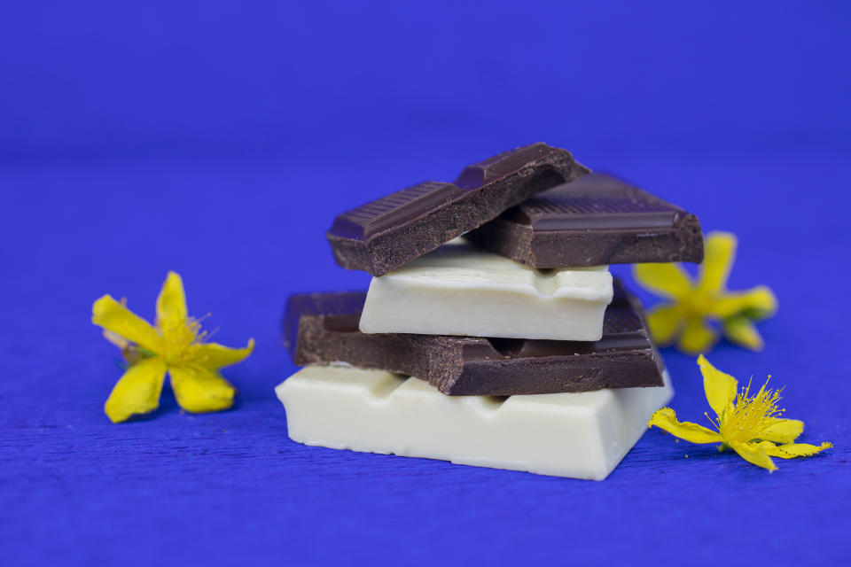 pieces of milk chocolate and dark chocolate  decorated with yellow flowers