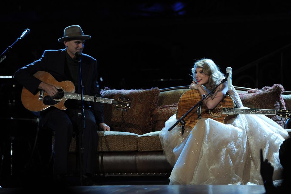 James Taylor and Taylor Swift perform onstage during the "Speak Now World Tour" at Madison Square Garden on November 22, 2011 in New York City.