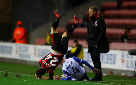 Soccer Football - FA Cup Third Round Replay - Wigan Athletic vs AFC Bournemouth - DW Stadium, Wigan, Britain - January 17, 2018 Wigan Athletic’s David Perkins fouls Bournemouth's Ryan Fraser as Bournemouth manager Eddie Howe looks on REUTERS/Phil Noble