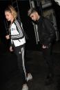 Only a a supermodel could pull off a head to toe tracksuit and still look fierce. Props, Gigi, Props. Oh yeah, and Zayn looks alright too. <br><br> Credit: Splash