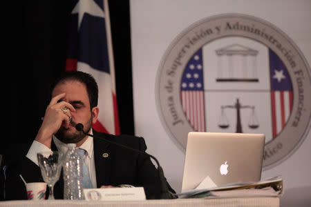 Christian Sobrino, Puerto Rico's government liaison to the territory's federal oversight board attends a meeting of the Financial Oversight and Management Board for Puerto Rico at the College of Engineers and Land Surveyors in San Juan, Puerto Rico October 31, 2017. REUTERS/Alvin Baez