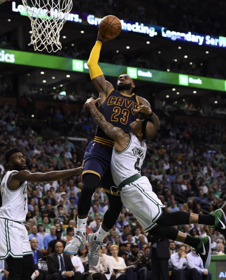 Isaiah Thomas tries to stop LeBron James from getting to the rim in Game 1 of the Eastern Conference finals. (USA Today)