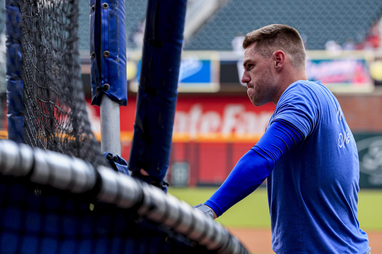 Los Angeles Dodgers first baseman Freddie Freeman (5) waits during batting practice before a baseball game against the Atlanta Braves, Friday, June 24, 2022 in Atlanta. (AP Photo/Butch Dill)