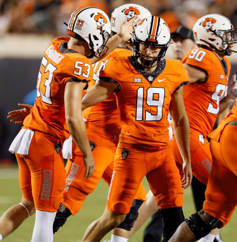 Oklahoma State's Alex Hale (19) is the frontrunner to be the starting placekicker this season.