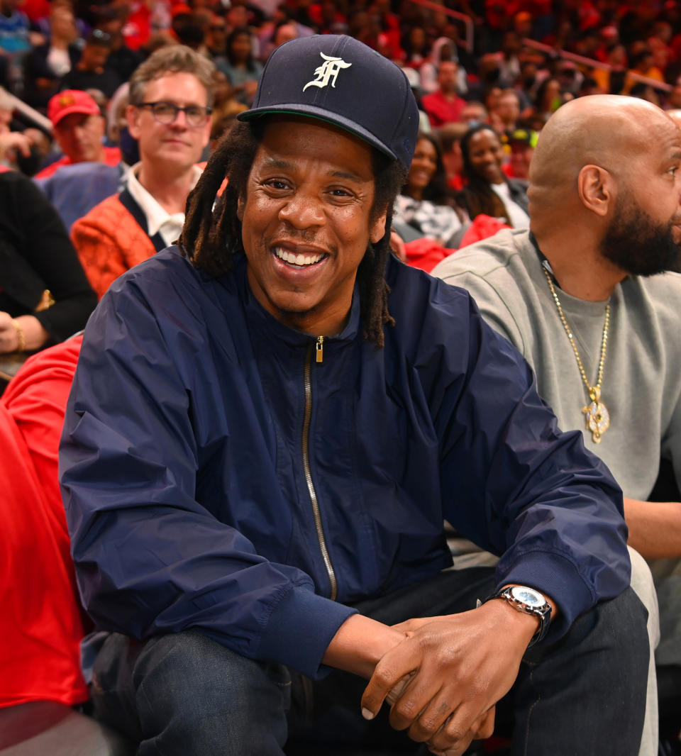 Jay-Z smiling in the stands