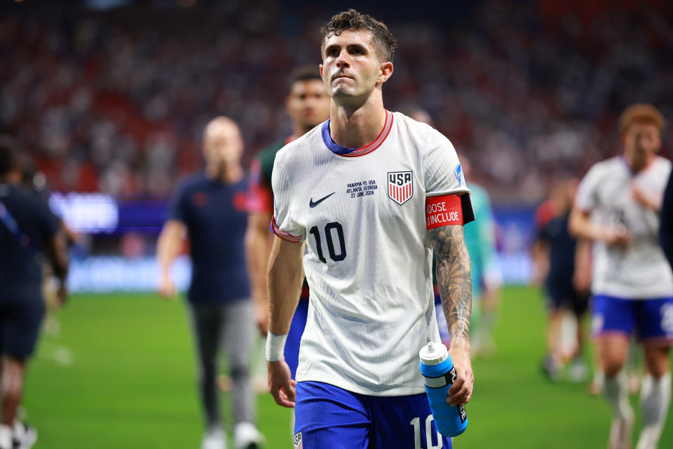 ATLANTA, GEORGIA - JUNE 27: Christian Pulisic of the United States reacts as he leaves the field after losing the CONMEBOL Copa América USA 2024 Group C match between Panama and the United States at Mercedes-Benz Stadium on June 27, 2024 in Atlanta, Georgia.  (Photo by Heitor Vivas/Getty Images)