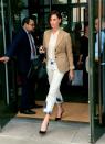 <p>It's easy to veer into fashion victim territory with acid washed denim, but Charlize Theron tones it down with a polished blazer and pointy-toe pumps.</p>