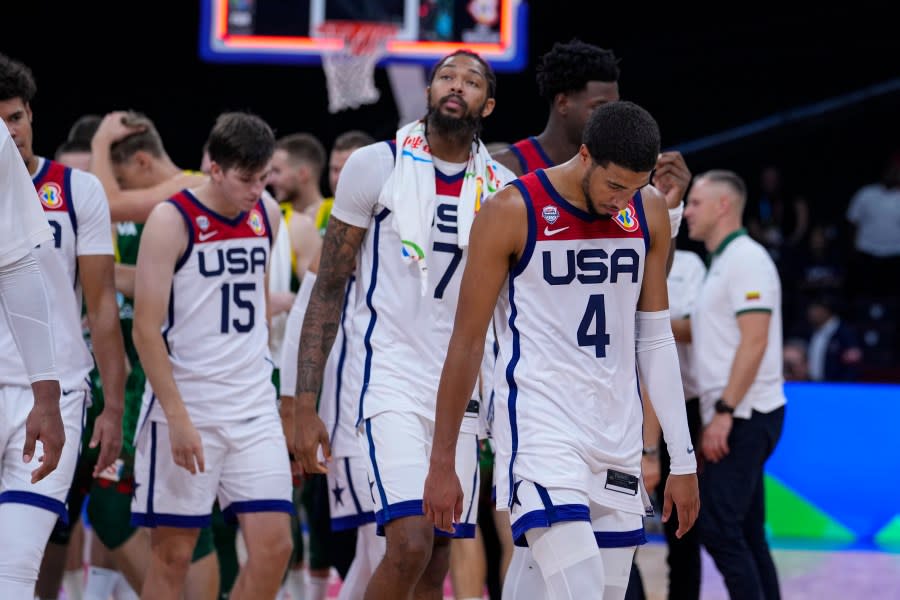 U.S. guard Tyrese Haliburton (4) leads the team off the court after a loss to Lithuania in a Basketball World Cup second-round match in Manila, Philippines Sunday, Sept. 3, 2023.(AP Photo/Michael Conroy)