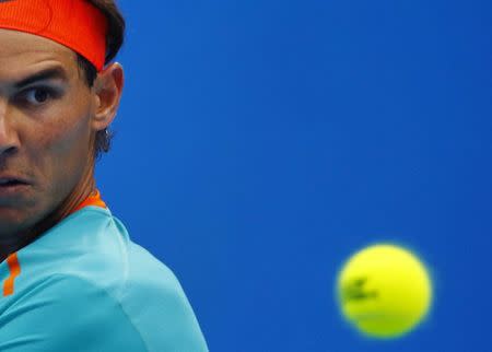 Rafael Nadal of Spain returns a shot to Richard Gasquet of France during their men's singles match at the China Open tennis tournament in Beijing September 30, 2014. REUTERS/Petar Kujundzic