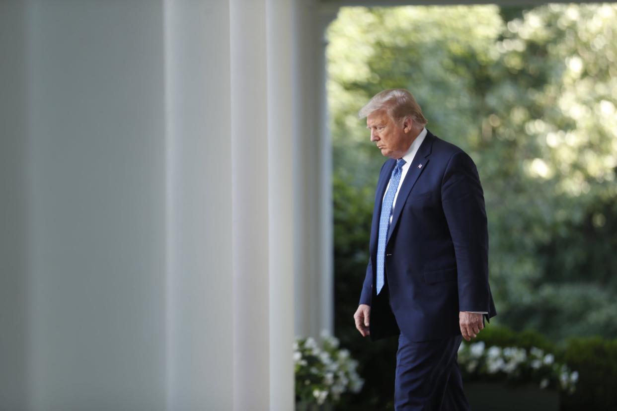 Donald Trump arrives in the Rose Garden of the White House to make a statement threatening to deploy the US military to crush George Floyd protests: EPA