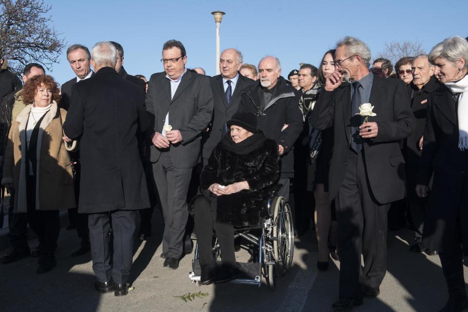 Mother of Greek late ambassador to Brazil Kyriakos Amiridis, Polymnia Amiridou, center, attends the funeral of her son, at the northern Greek city of Thessaloniki, Sunday, Jan. 15, 2017. Police have said they believe Amiridis, whose charred body was found in a car in Brazil, was killed by his wife's lover under her orders. (AP Photo/Giannis Papanikos)