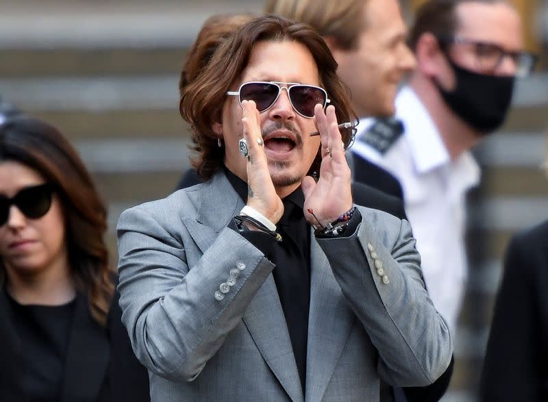 Actors Johnny Depp and Amber Heard at the High Court in London