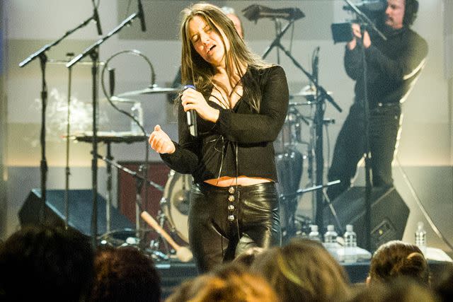 <p>Bill Tompkins/Getty</p> Paula Cole performing in San Francisco in October 2003