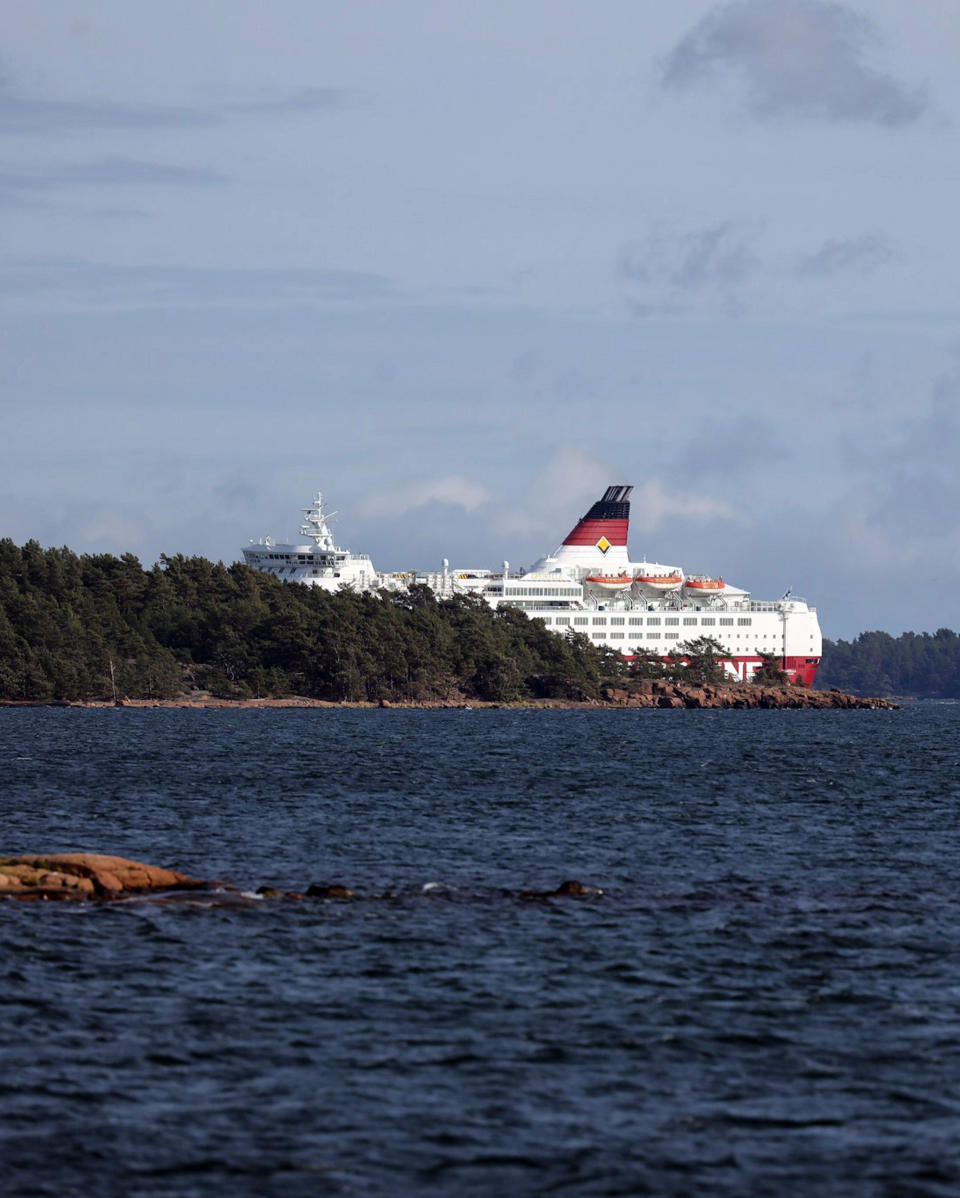 Viking Line's cruise ship M/S Amorella is seen near the Aland islands, seen from Finland, Sunday, Sept. 20, 2020. Finnish authorities say a Baltic Sea passenger ferry with nearly 300 people has run aground in the Aland Islands archipelago between Finland and Sweden without injuries. (Niclas Norlund/Lehtikuva via AP)