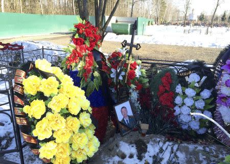 A general view shows the grave of Russian serviceman Sergei Chupov at a cemetery in the Balashikha district of the Moscow region, Russia, March 23, 2016. REUTERS/Maria Tsvetkova