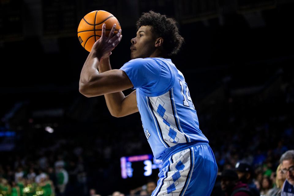 North Carolina's Puff Johnson (14) shoots during the first half of an NCAA college basketball game against Notre Dame Wednesday, Feb. 22, 2023, in South Bend, Ind. (AP Photo/Michael Caterina)