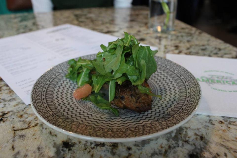 The Peruvian Chicken Skewers were topped with an arugula and grapefruit salad. The tender chicken was spicy, citrusy and vinegary.