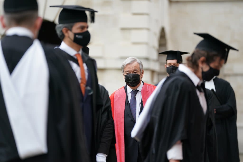 UN secretary-general Antonio Guterres (centre) at Cambridge University to receive an honorary degree (Joe Giddens/PA) (PA Wire)