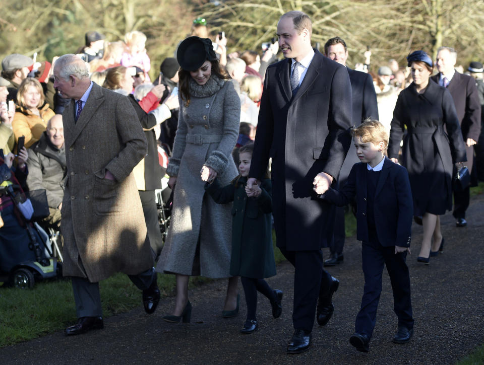 Britain's Prince Charles, Kate, Duchess of Cambridge, Prince William and their children Prince George, right, and Princess Charlotte arrive to attend the Christmas Day morning church service at St. Mary Magdalene Church in Sandringham, Norfolk, England, Wednesday, Dec. 25, 2019. (Joe Giddens/PA via AP)