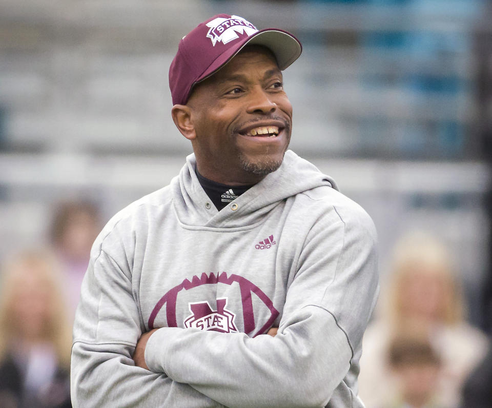 FILE - Then-Mississippi State interim head coach Greg Knox watches his team warm up before the TaxSlayer Bowl NCAA college football game against Louisville, Dec. 30, 2017, in Jacksonville, Fla. Mississippi State fired Zach Arnett on Monday, Nov. 13, 2023, after less than one season as head coach, just under a year since he took over the Bulldogs after the tragic passing of Mike Leach from a heart issue. Senior offensive analyst Greg Knox, who has worked around the SEC for 28 of his 35 years of coaching, will serve as interim head coach for the remainder of the 2023 season. (AP Photo/Stephen B. Morton, File)