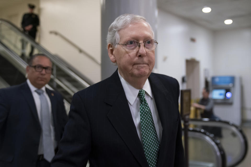 Senate Majority Leader Mitch McConnell, R-Ky., heads to a briefing with Secretary of State Mike Pompeo, Defense Secretary Mark Esper and other national security officials on the details of the threat that prompted the U.S. to kill Iranian Gen. Qassem Soleimani in Iraq, Wednesday, Jan. 8, 2020 on Capitol Hill in Washington.(AP Photo/J. Scott Applewhite)