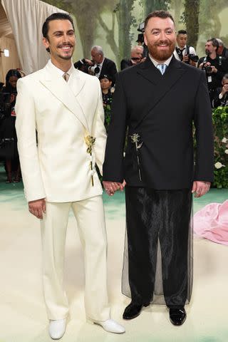 <p>Jamie McCarthy/Getty</p> Christian Cowan and Sam Smith attend The 2024 Met Gala Celebrating "Sleeping Beauties: Reawakening Fashion" on May 06, 2024 in New York City.